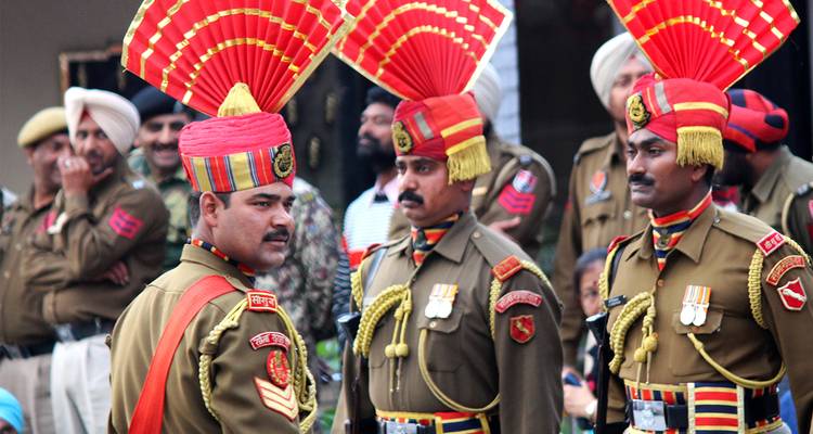 Group of soldiers in traditional military attire from India.