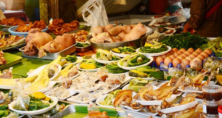 Assortment of food displayed at a market stall.