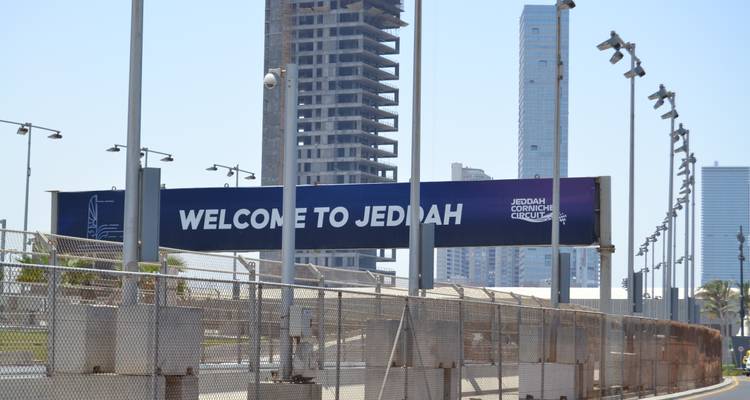 Jeddah Corniche Circuit entrance with high-rise buildings in the background.