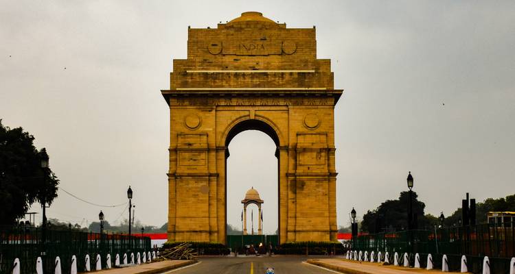 India Gate standing prominent on the road.