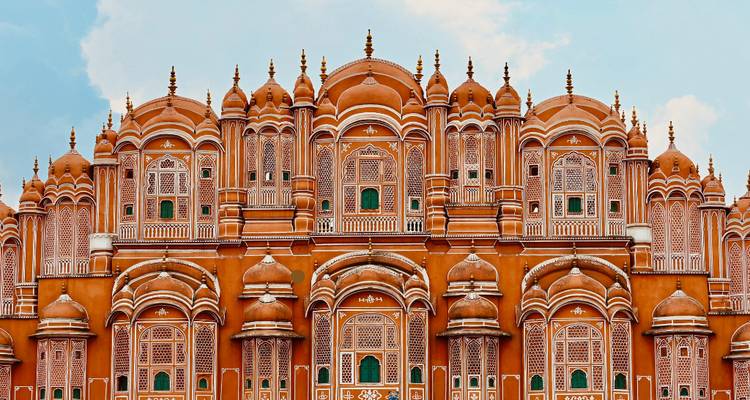 The Hawa Mahal, a stunning pink sandstone palace with intricate latticework.