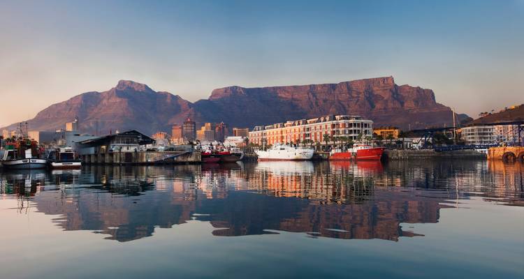 Harbor view with Table Mountain in the background at dusk.