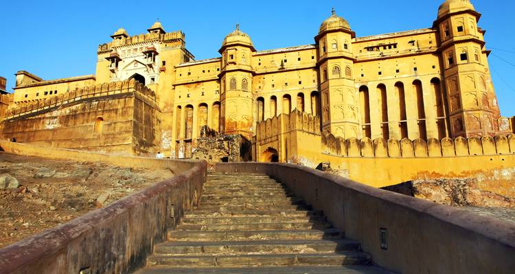 Beautiful yellow fort architecture with stairs leading up.