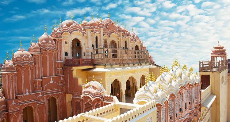 The Hawa Mahal, an iconic pink palace with intricate windows.