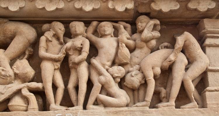 Detailed stone carvings on a temple facade.