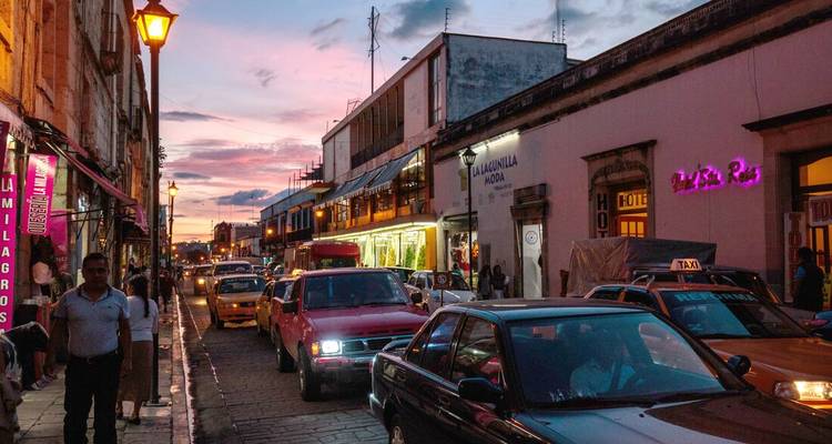 Busy street in a city at dusk