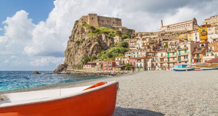 Picturesque coastal village on a pebbled beach.