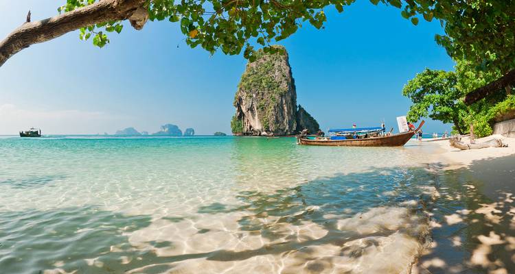 Tropical beach with clear waters and rock formations