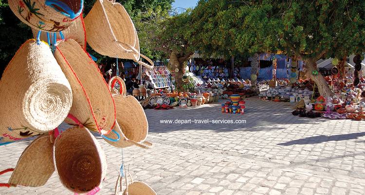 Market place with various handmade goods and watermark.