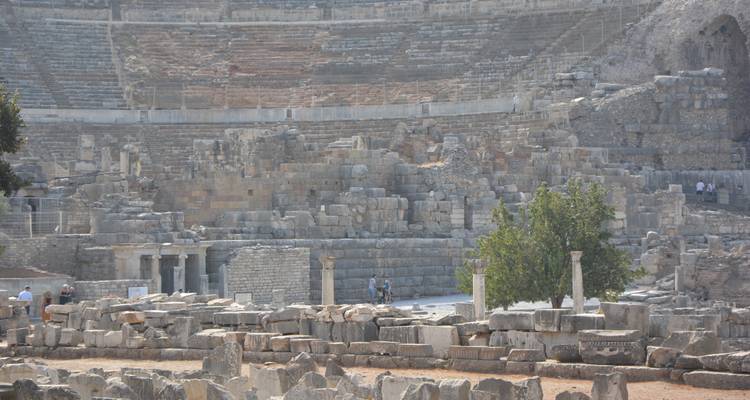 Ancient Roman amphitheater with impressive stonework.