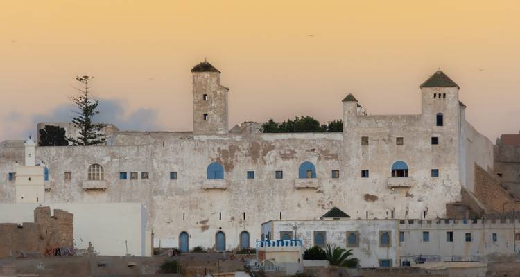 Fortified white building during sunset in El Jadida.