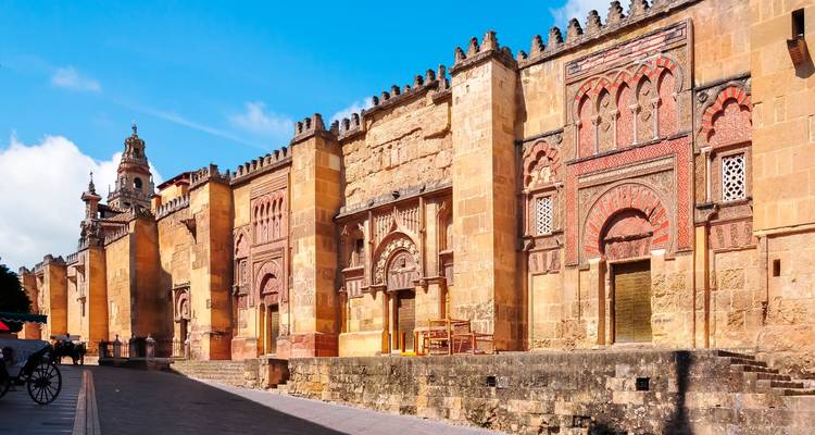 Historic mosque facade with intricate detailing.