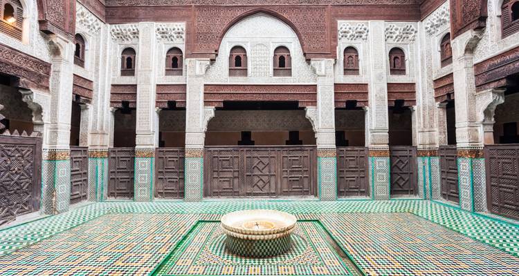 Intricately designed courtyard with a fountain.