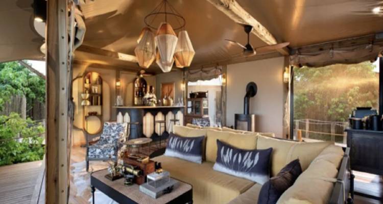 Luxurious interior of a safari lodge with stylish furnishings.