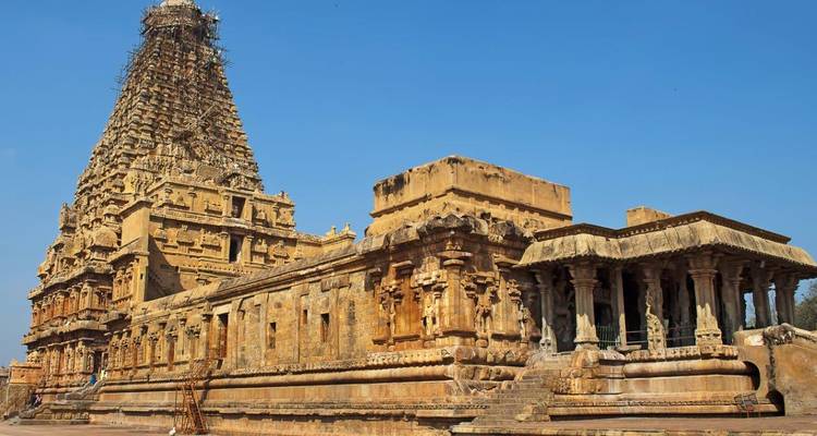 The grand architecture of the Brihadeeswarar Temple in Thanjavur with clear blue skies.