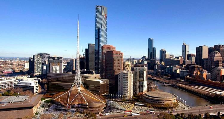 Aerial view of a skyline with the Arts Centre spire in Melbourne.