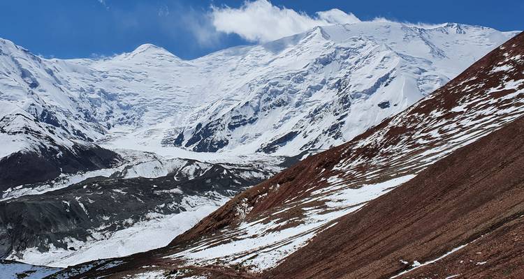 Snow-covered peaks with rocky terrain