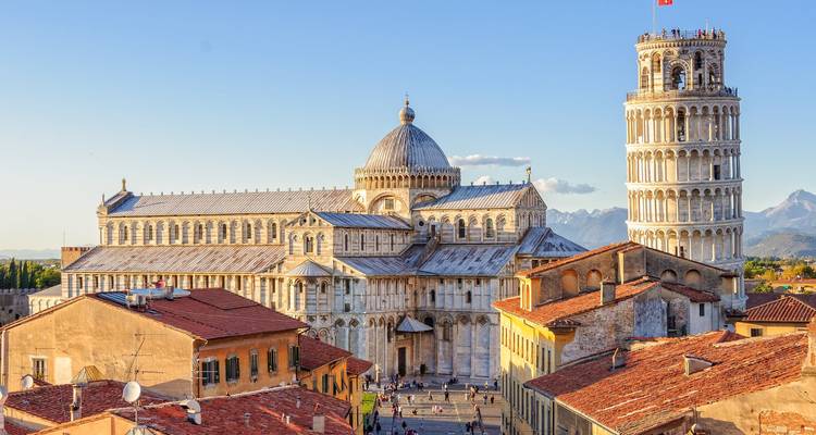 Iconic leaning tower and cathedral in a historic city center.