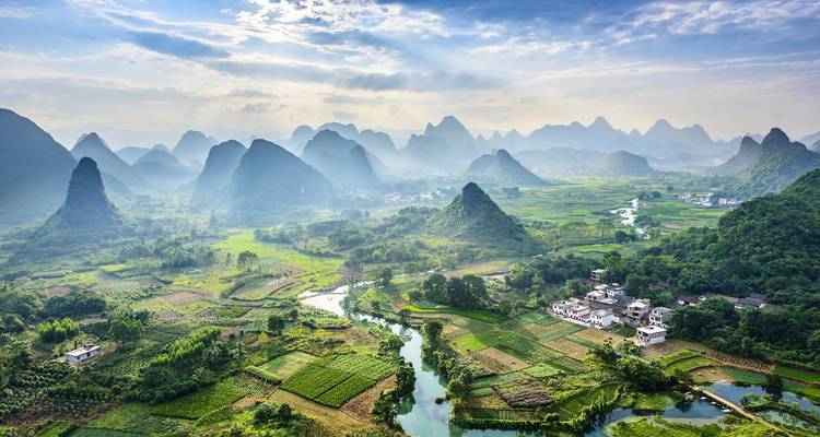 Scenic view of karst mountains and a river valley.