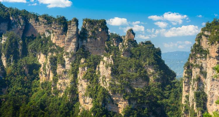 Zhangjiajie National Forest Park with towering rock formations.
