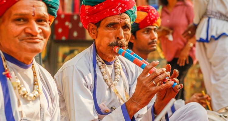 Cultural event with musicians playing traditional instruments.