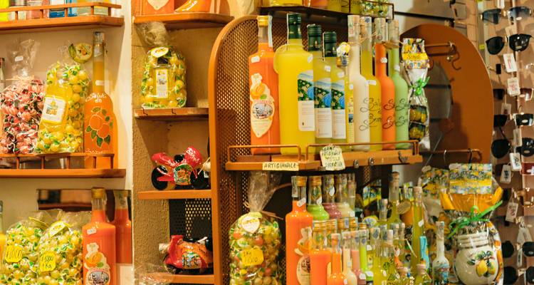 A display of colorful liqueurs and candies.