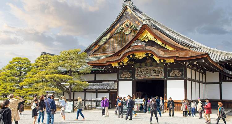 Nijo Castle in Kyoto with visitors around.