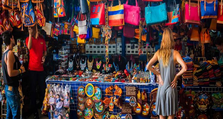 Vibrant market with colorful textiles and goods.