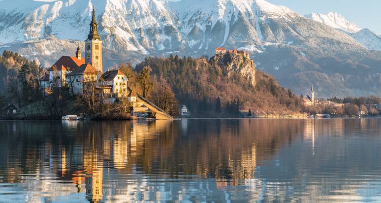 A serene view of Lake Bled with a church on an island