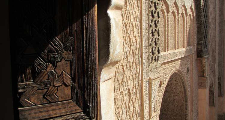 Detailed view of ornate Moroccan architecture with geometric patterns.