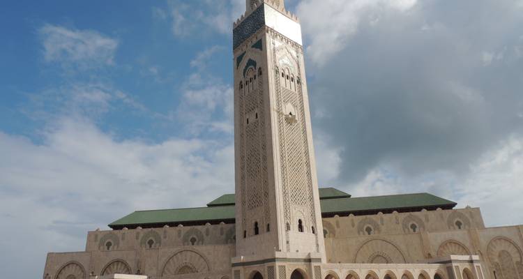 Hassan II Mosque with cloudy sky