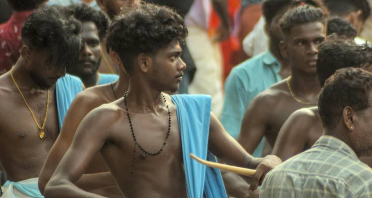 Group of people in a traditional costume parade.