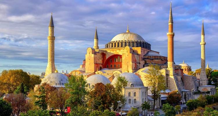 Historical mosque with multiple minarets.