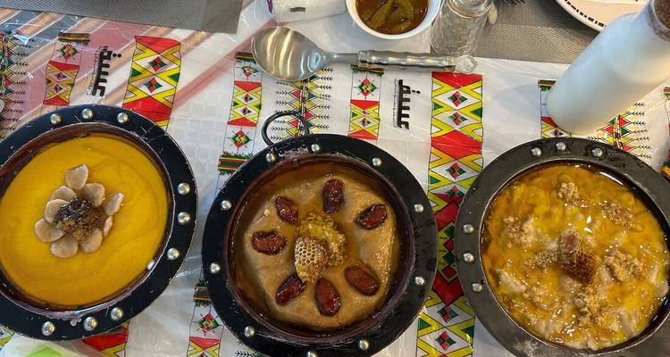 Three traditional dishes on a table.