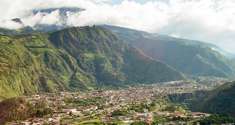 Mountain town nestled in a green valley