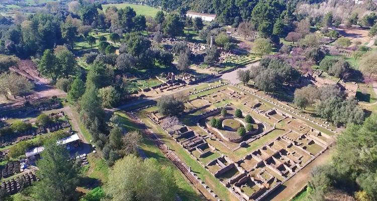 Aerial panorama of the archaeological ruins and wooded surroundings of Ancient Olympia