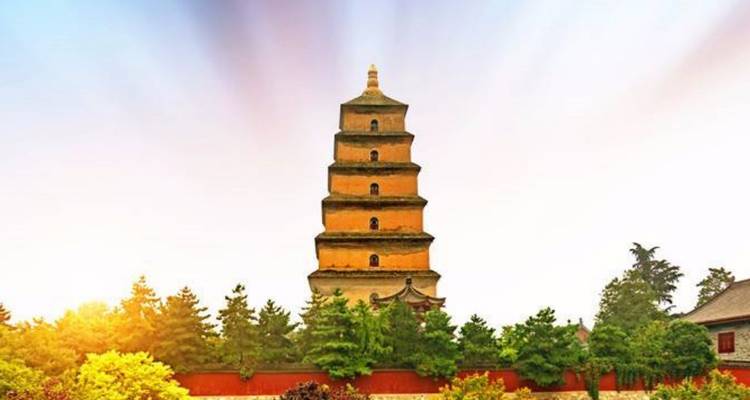 Big Wild Goose Pagoda under a clear sky with sunlight in Xi'an.