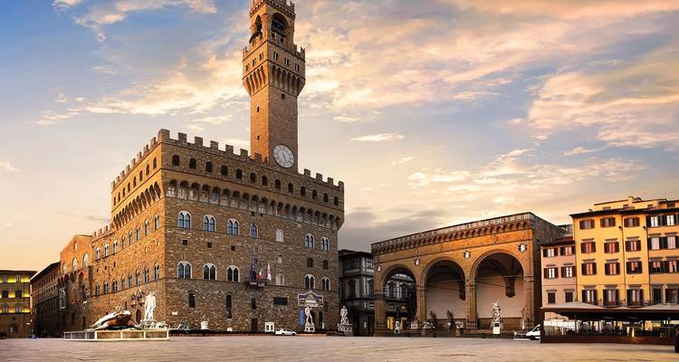 Historic Palazzo Vecchio dominating Florence’s Piazza della Signoria at dusk