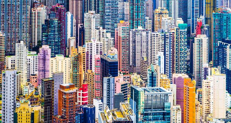 Tightly packed colorful high-rise apartment blocks in Hong Kong