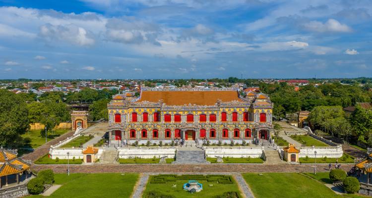 Aerial perspective of Hue’s Imperial Citadel with its ornate red façade and formal gardens.