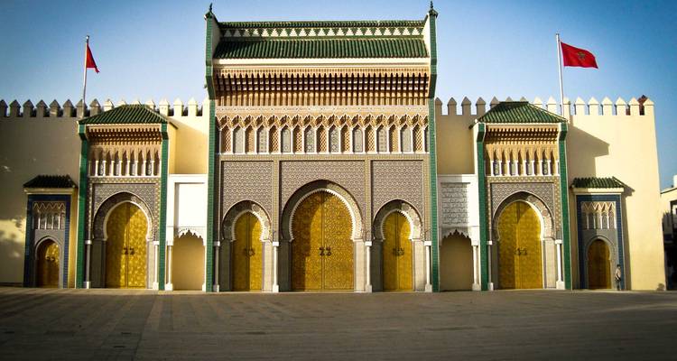 Ornate golden gates and arches of the Royal Palace in Fes.