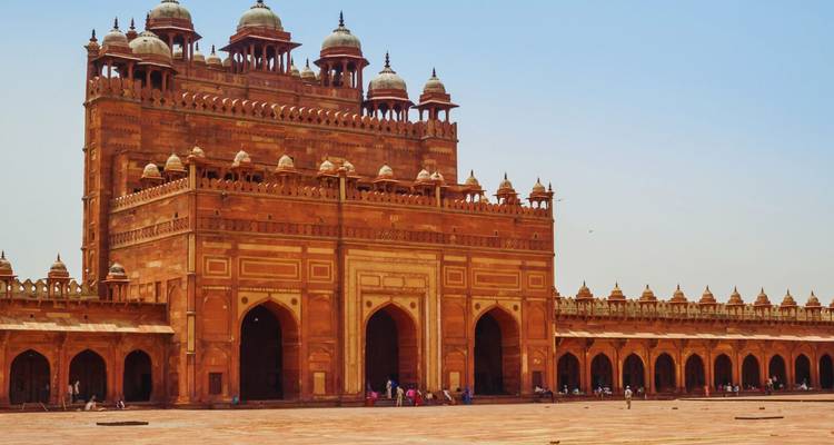 Grand sandstone gateway of Buland Darwaza dominating the courtyard of Fatehpur Sikri.