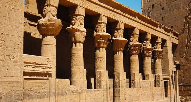 Well-preserved columned hall of Philae Temple with detailed hieroglyphics