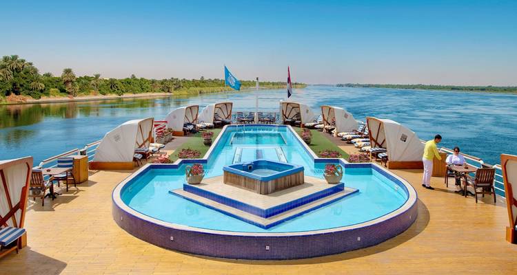 Upscale cruise deck with swimming pool sailing the Nile on a sunny day.