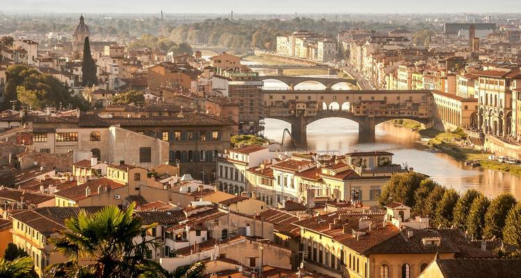 Golden sunrise over Florence with the Ponte Vecchio and Arno River
