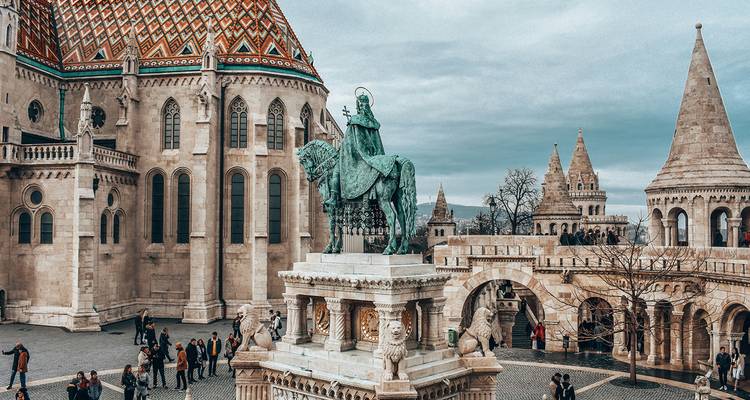Statue of St. Stephen on horseback anchors Fisherman's Bastion and Matthias Church in Budapest.