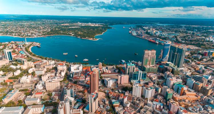 Aerial view of coastal Dar es Salaam with turquoise bay and busy port