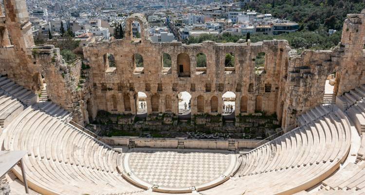 Symmetrical view of the stone seating and stage of the Odeon of Herodes Atticus amphitheatre.