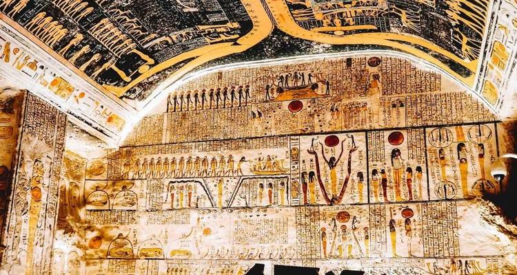 Colorful, well-preserved hieroglyphic wall carvings inside an ancient Egyptian tomb