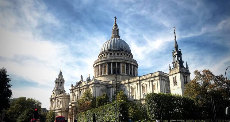 Majestic St Paul's Cathedral against a crisp blue sky with afternoon light